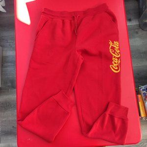 Coca-Cola sweatpants / training pants red with yellow printed logo men's size M